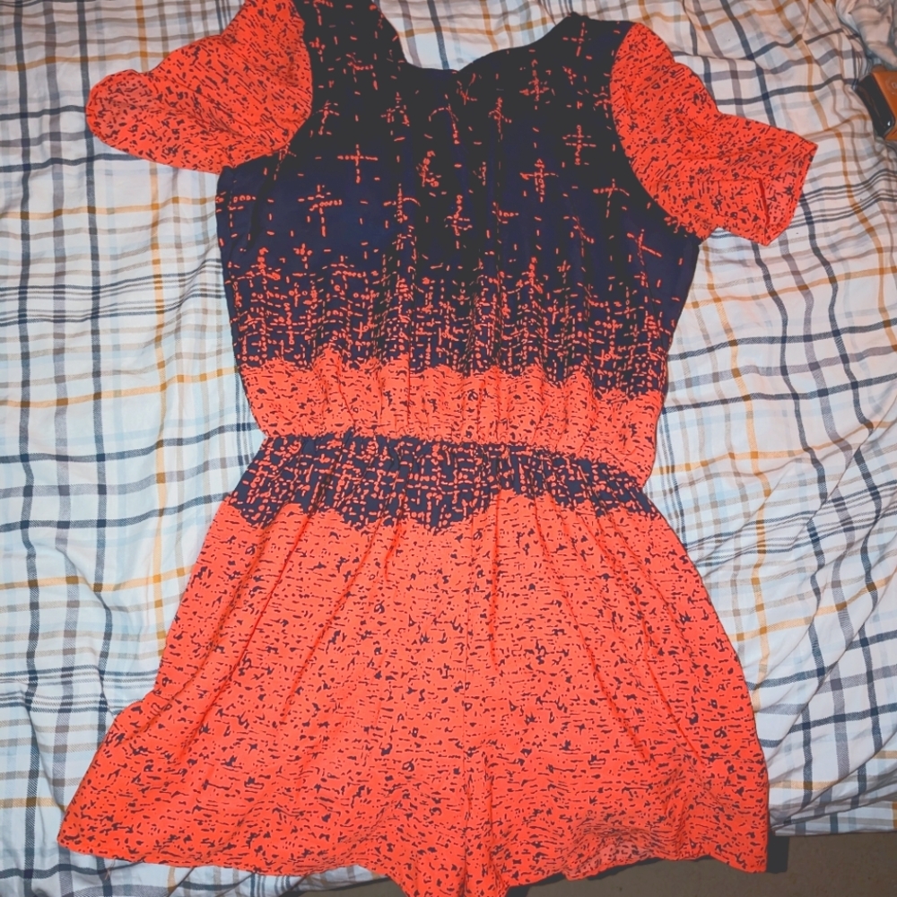 Bright orange and navy romper/jumpsuit